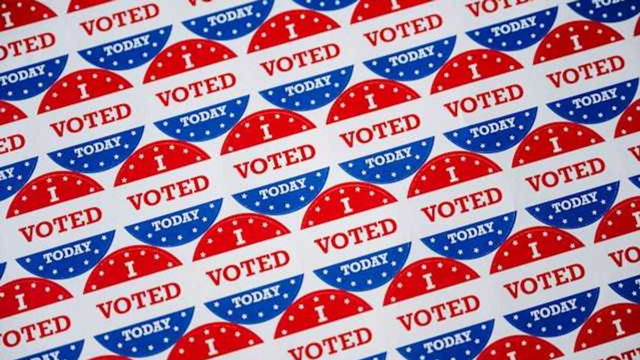 A sheet of 'I voted' stickers in red white and blue