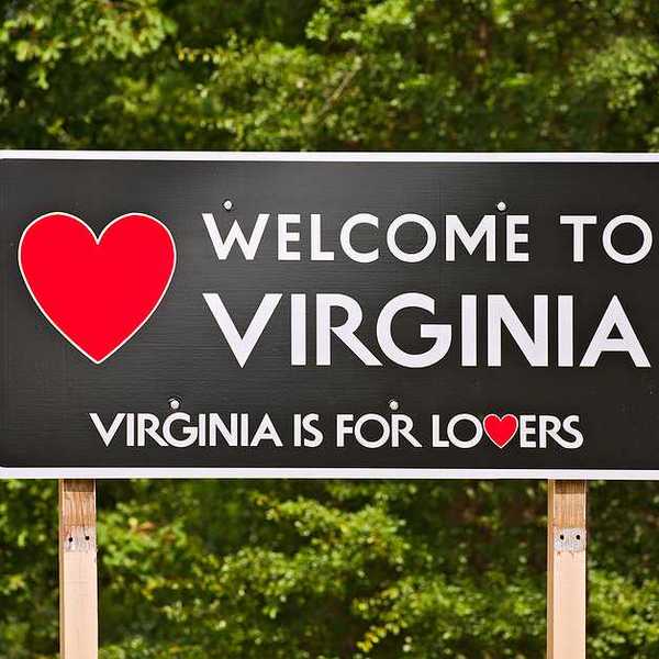 A sign saying "Welcome to Virginia" followed by "Virginia is for Lovers"