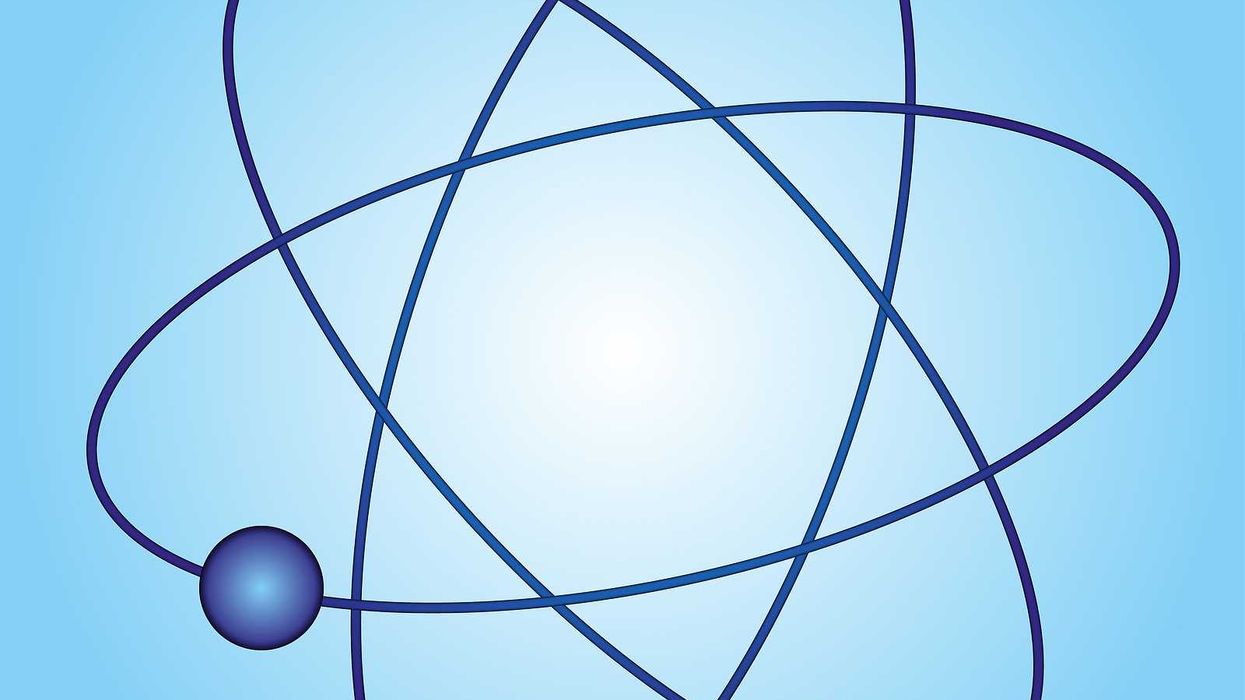 A simple model of an atom on a blue background