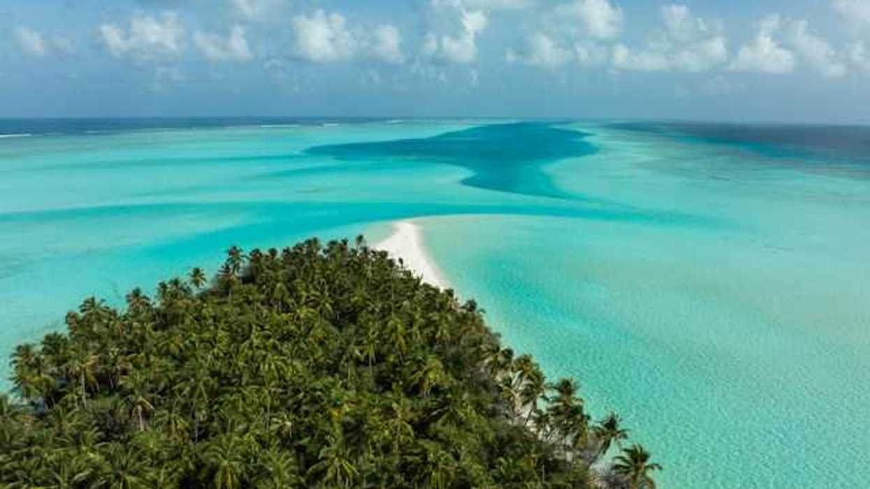A small tropical island viewed from the air