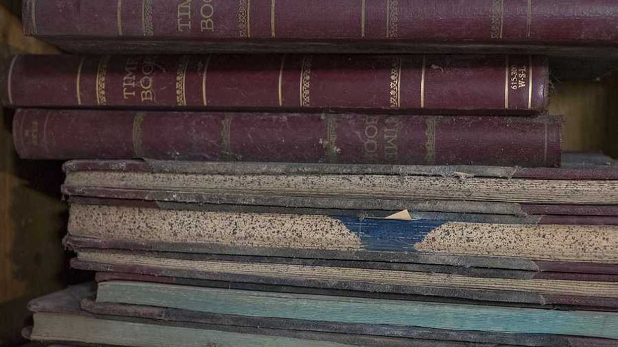 A stack of old ledger books