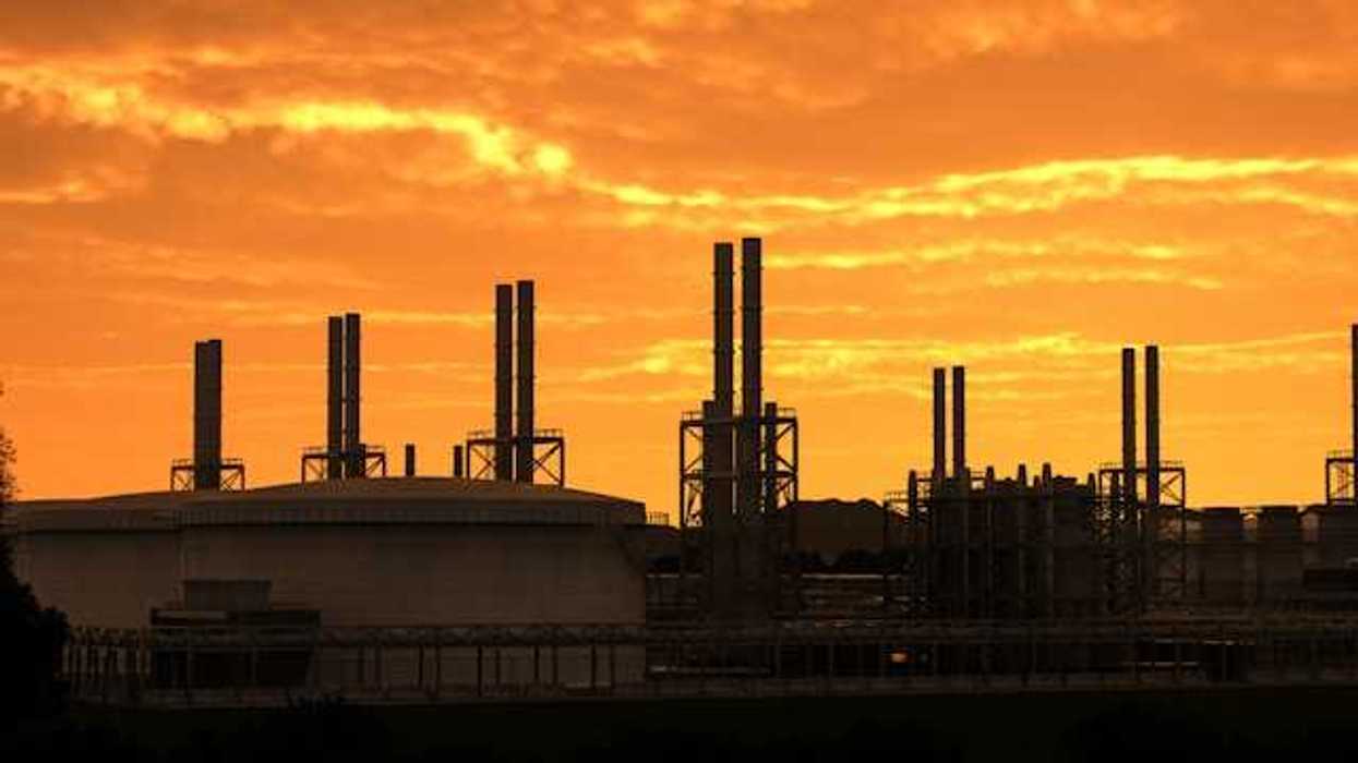 A sunset view of an industrial plant