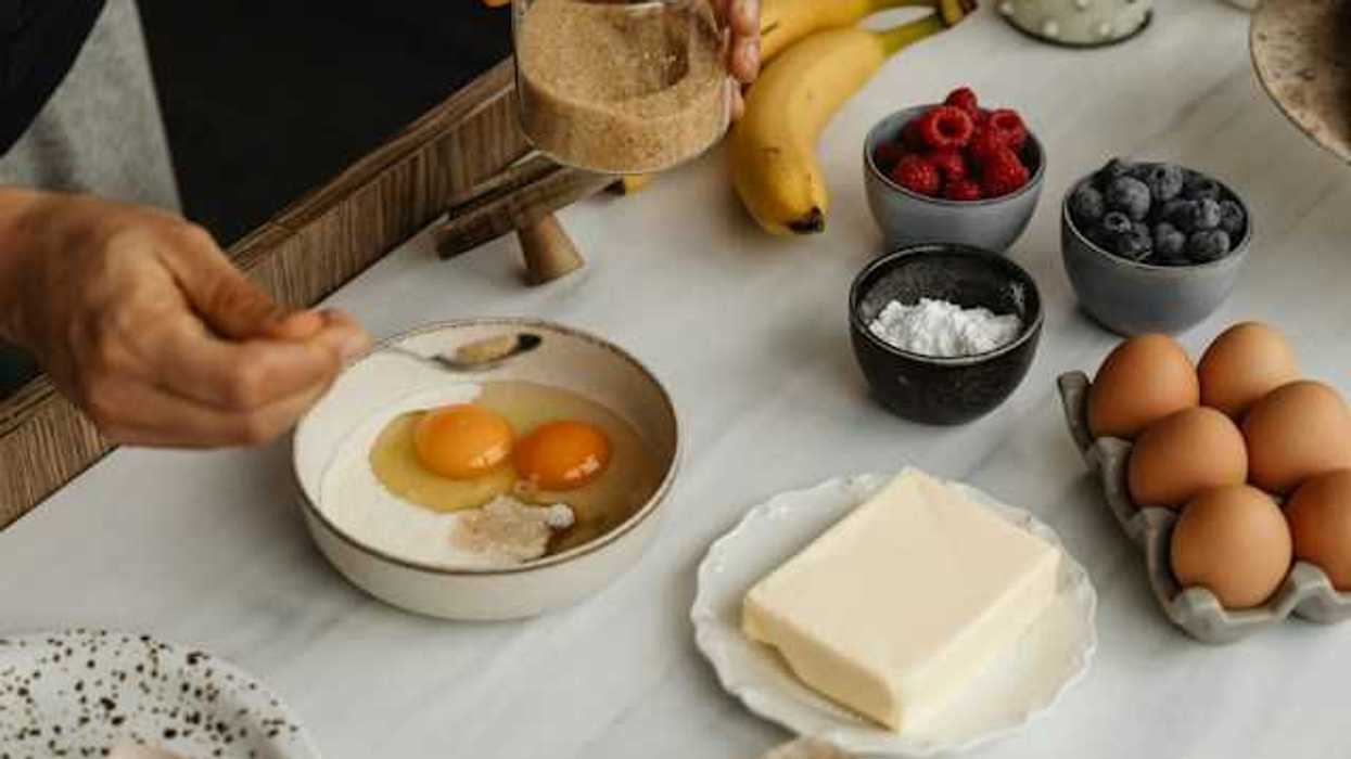 A table with types of food including eggs, butter and fruit