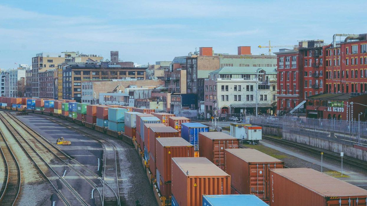a train yard filled with lots of train cars