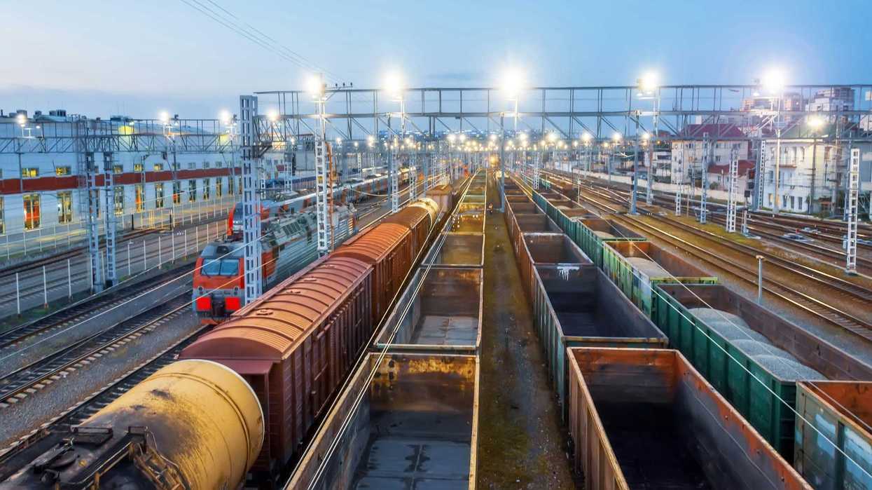 A train yard full of cargo trains
