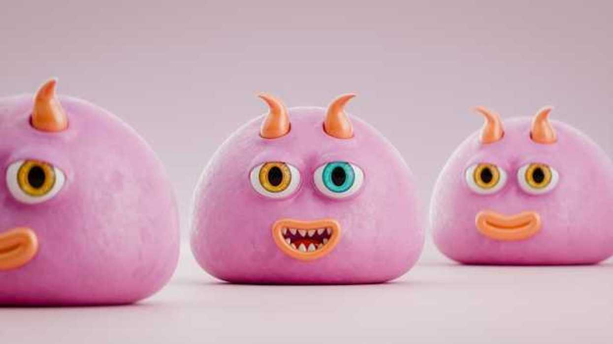 A trio of pink squishy toys with eyes and mouths