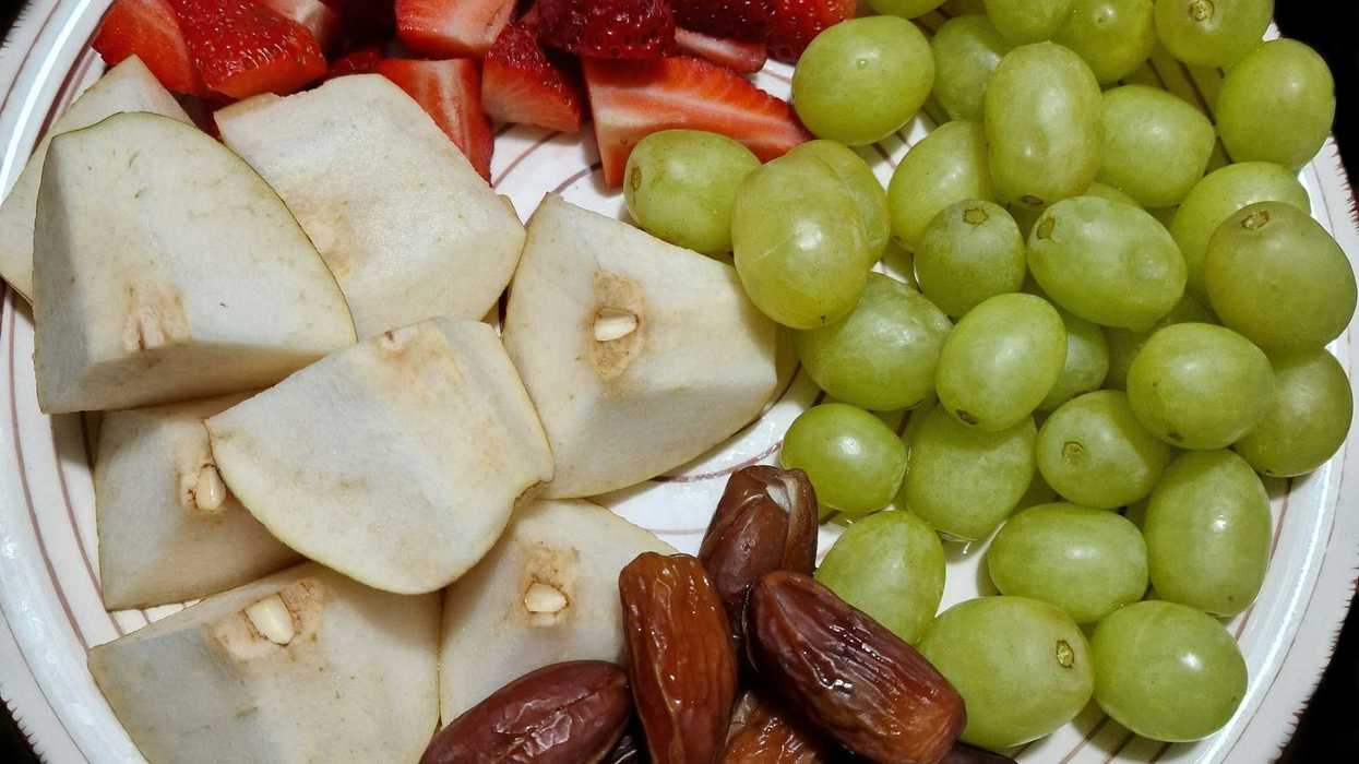 A variety of fruits arranged on a plate.