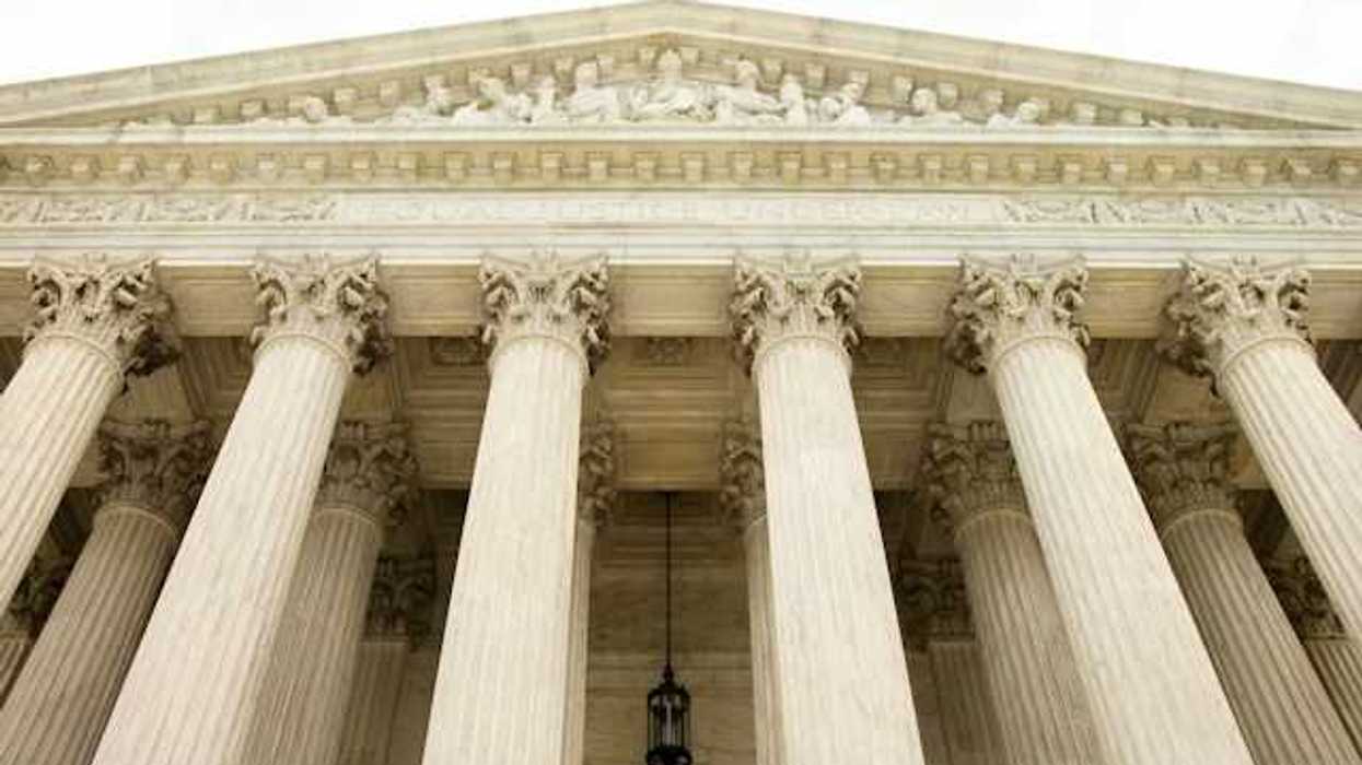 A view looking up at the facade of the Supreme Court building