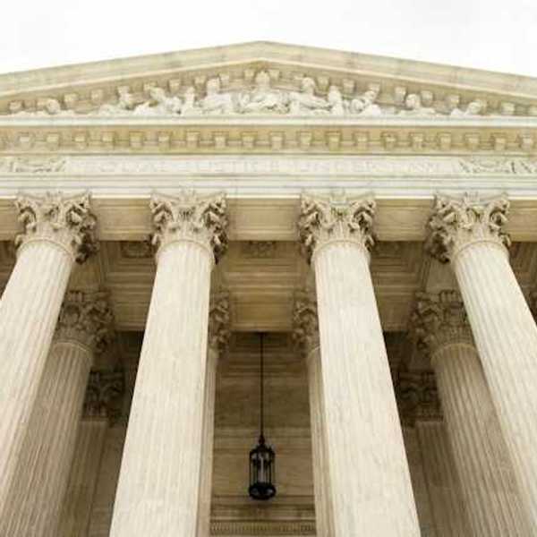 A view looking up at the facade of the Supreme Court building