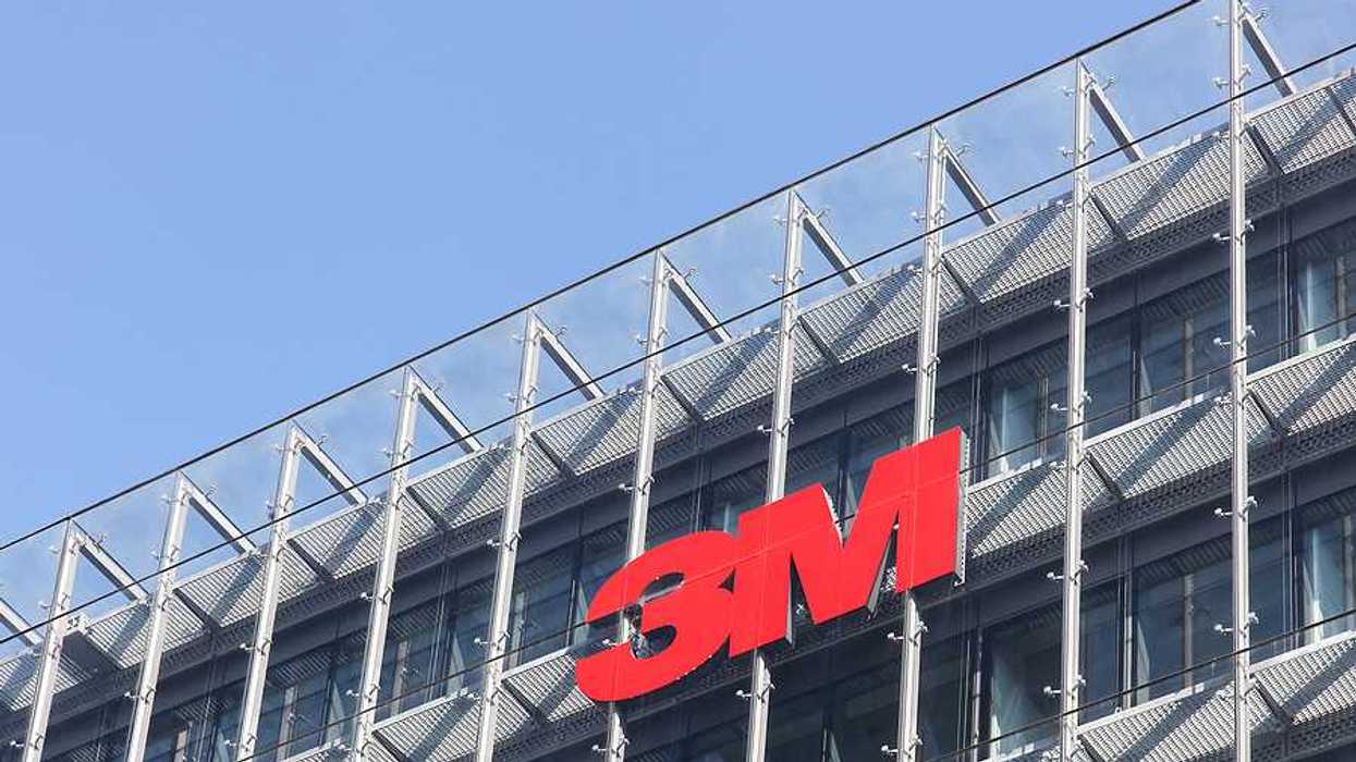 A view of a building with the 3M logo in red on the side