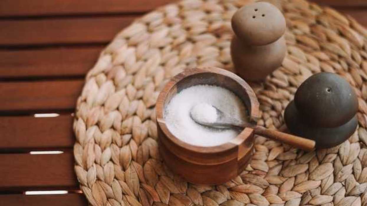 A view of a container of salt on a table