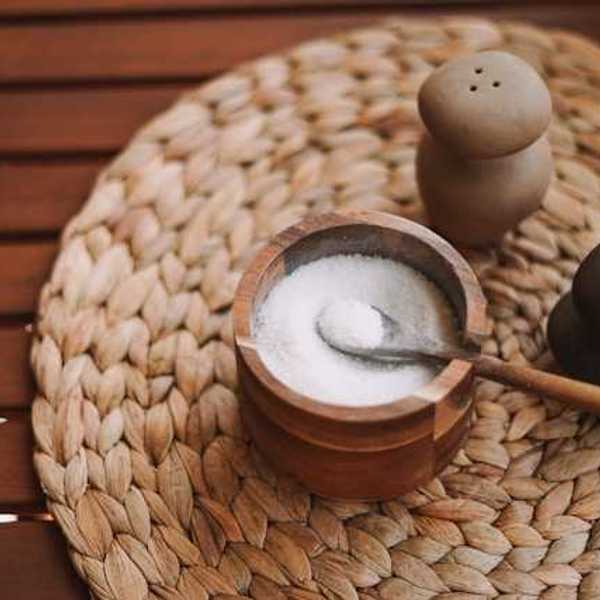 A view of a container of salt on a table