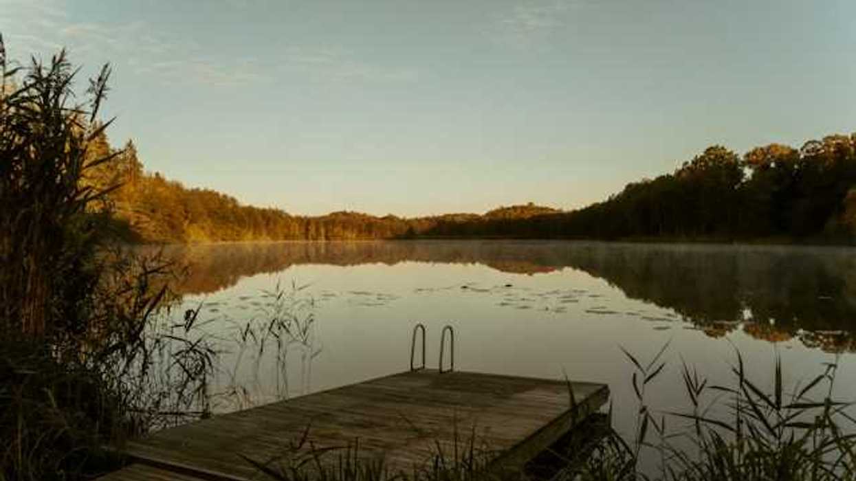 A view of a lake with a dock