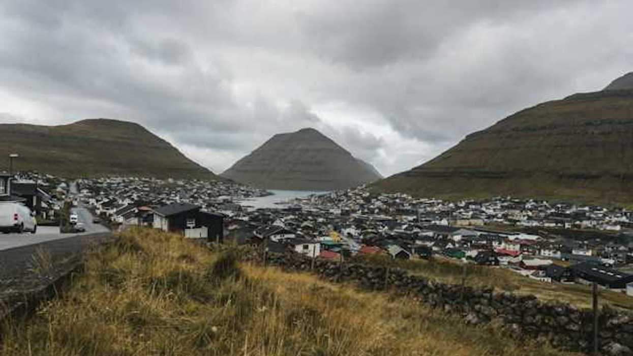 A view of a small fishing village town in the mountains