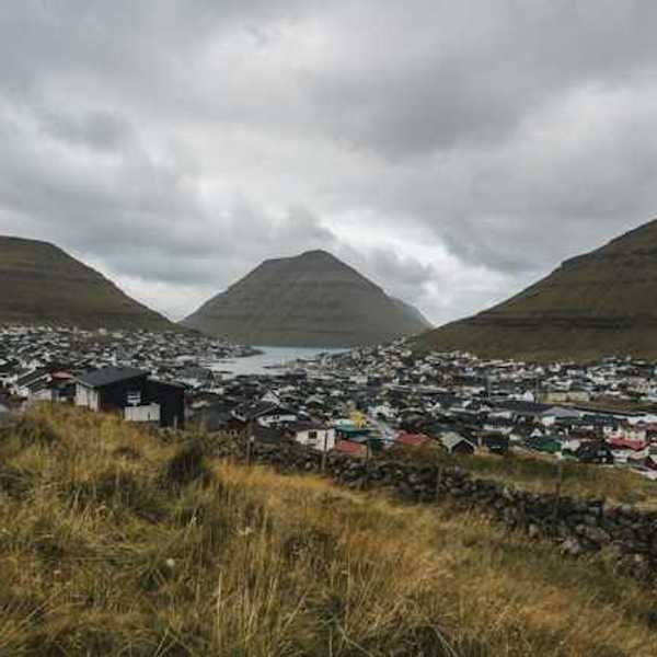 A view of a small fishing village town in the mountains
