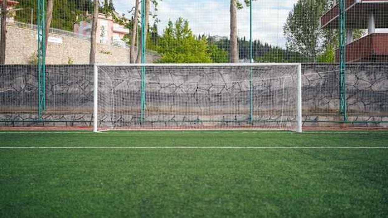 A view of a soccer field with artificial turf