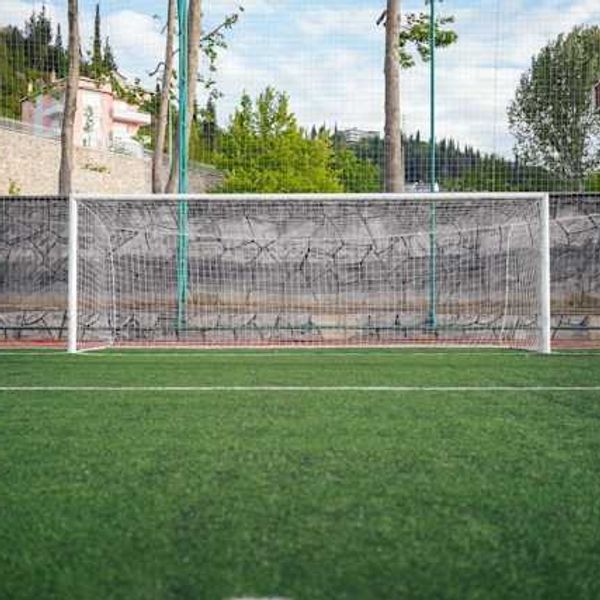 Recycling and reusing artificial turf containing microplastics