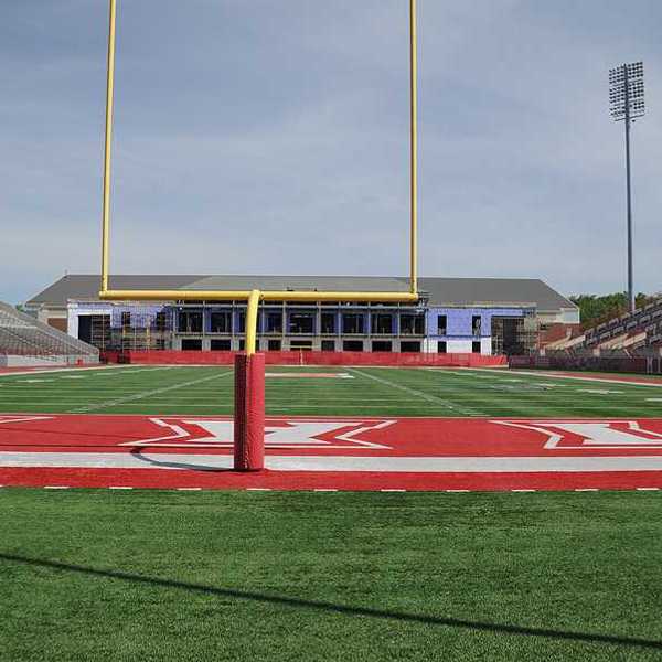 A view of a university stadium from the end zone