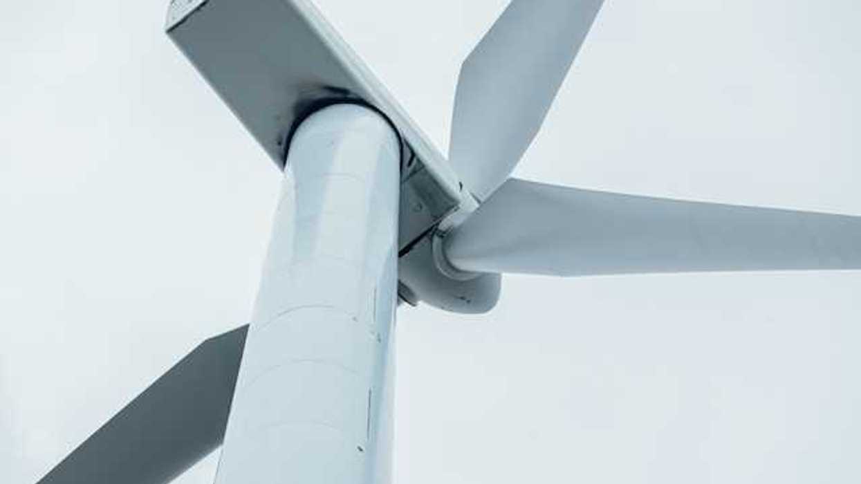 A view of a wind turbine from below