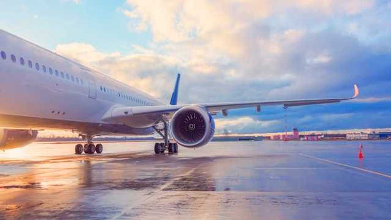 A view of an airplane sitting on the tarmac