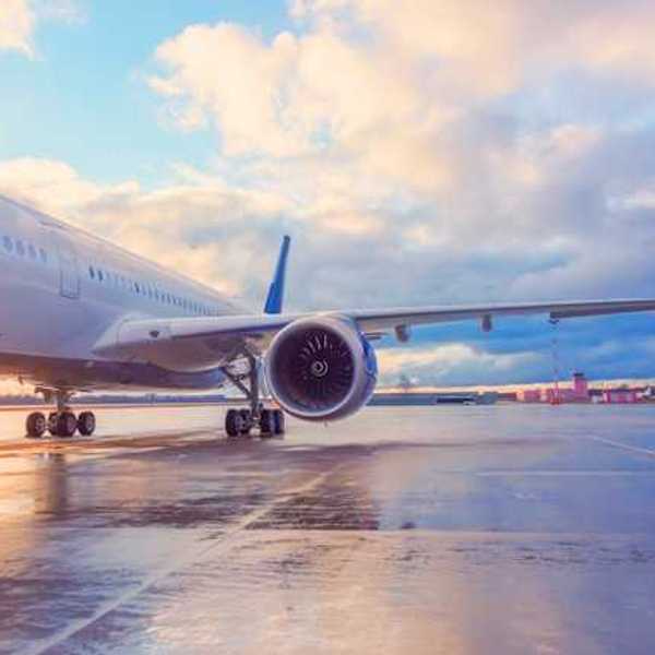 A view of an airplane sitting on the tarmac