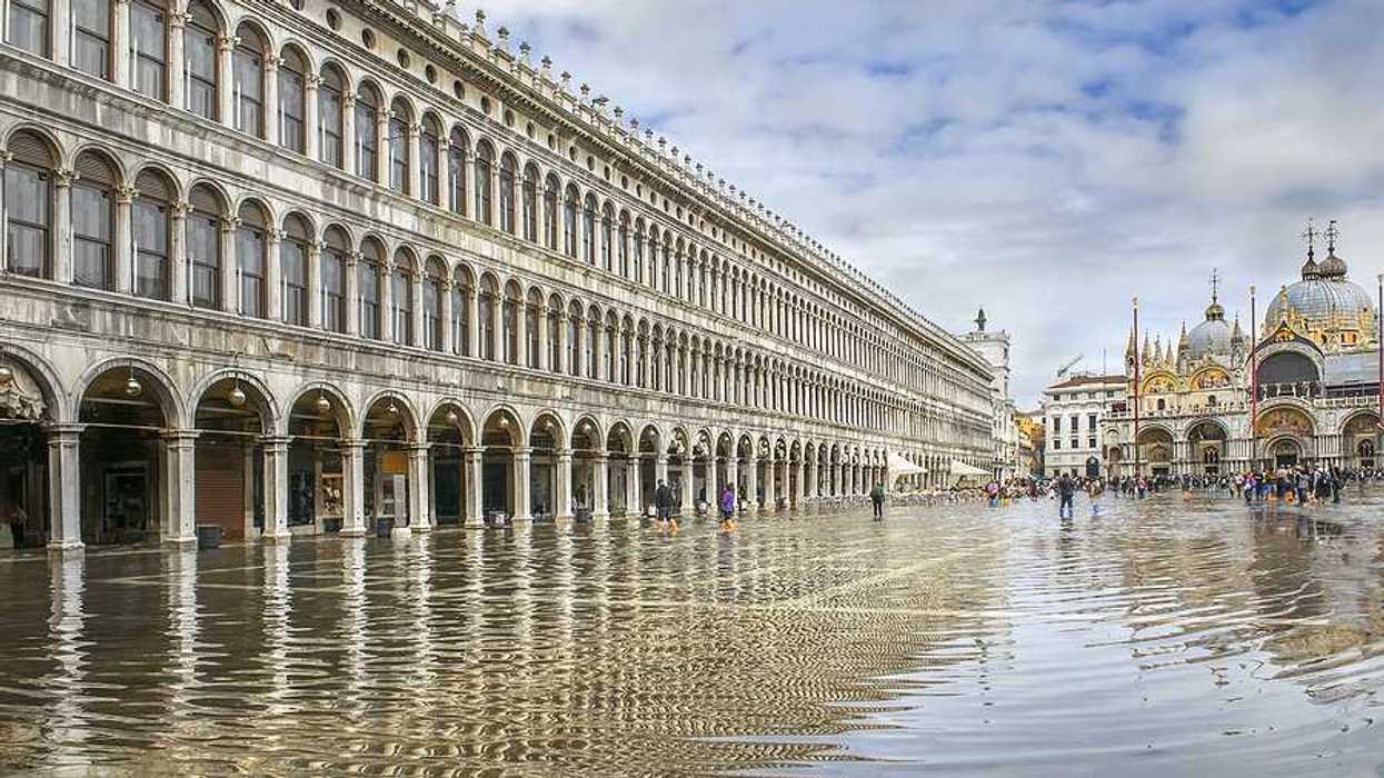 A view of St. Marks Square in Venice with floodwaters covering it