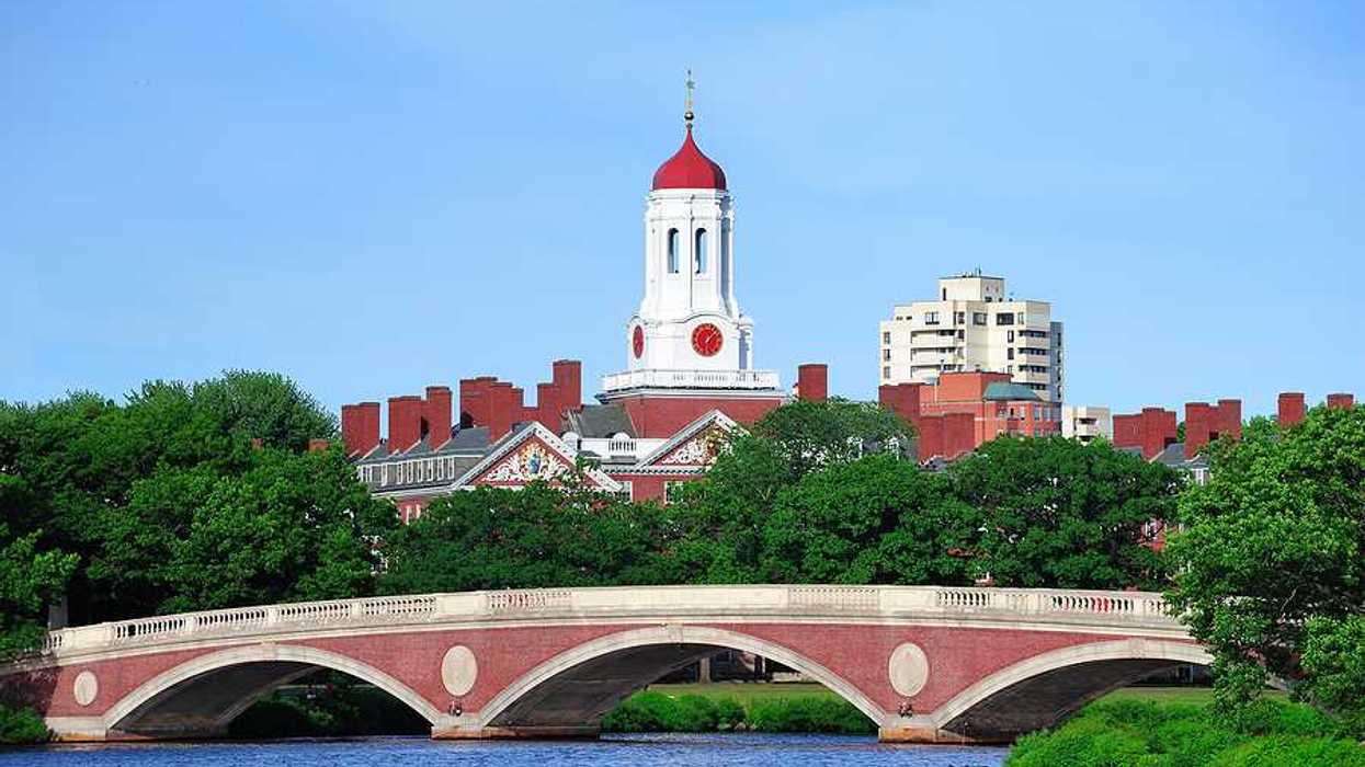 A view of the Charles River with the Harvard University campus in the background
