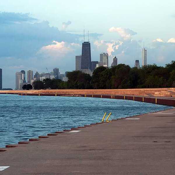 A view of the Chicago skyline with the lake in the foreground