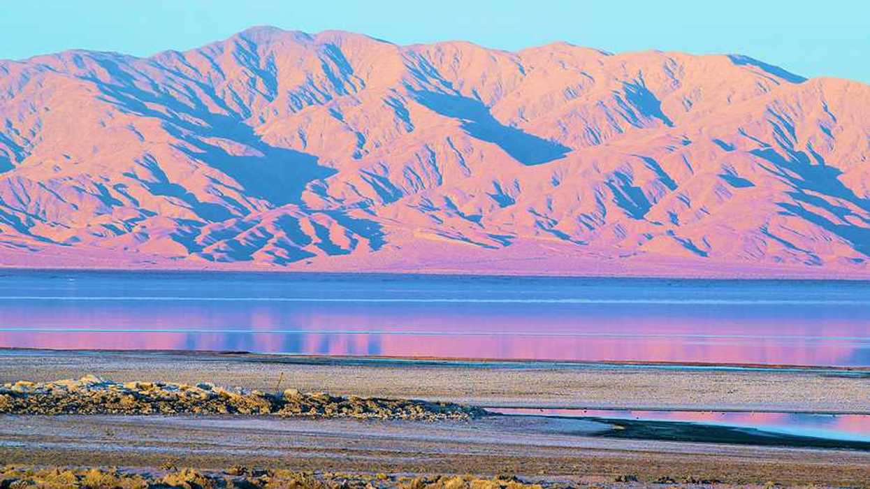 A view of the Salton Sea with mountains in the background