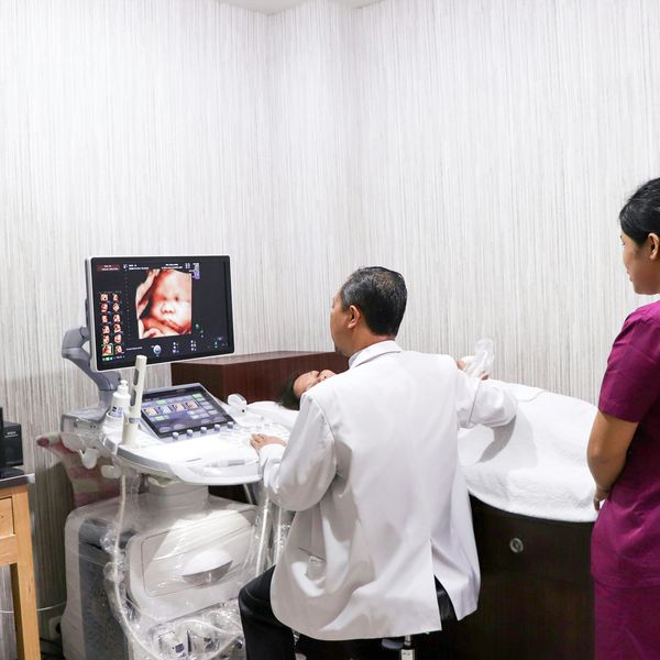 A woman receives an ultrasound