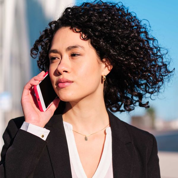 A woman speaks on the phone