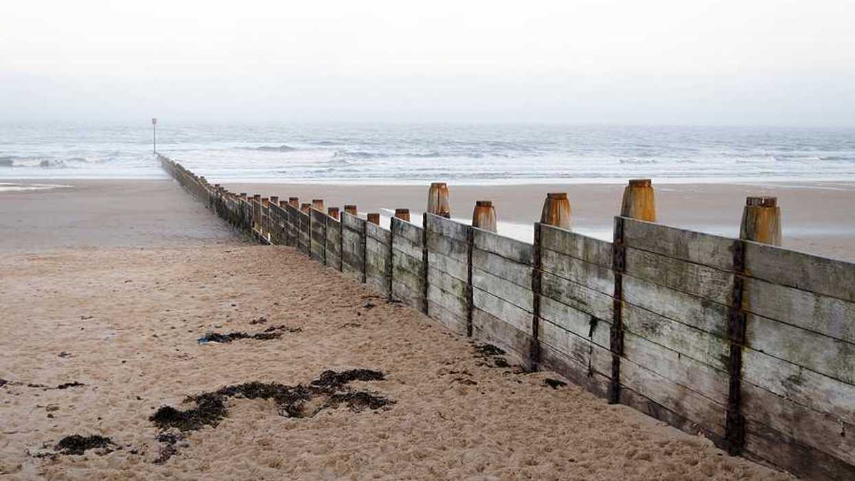 A wooden fence on Blyth beach