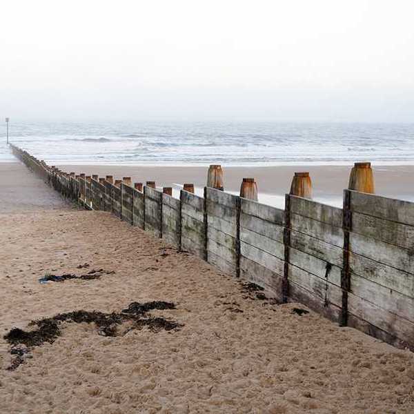 A wooden fence on Blyth beach
