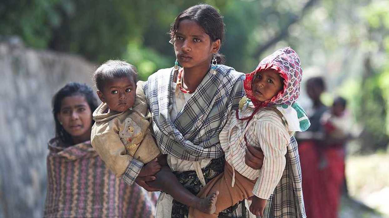 A young Nepalese woman with two children