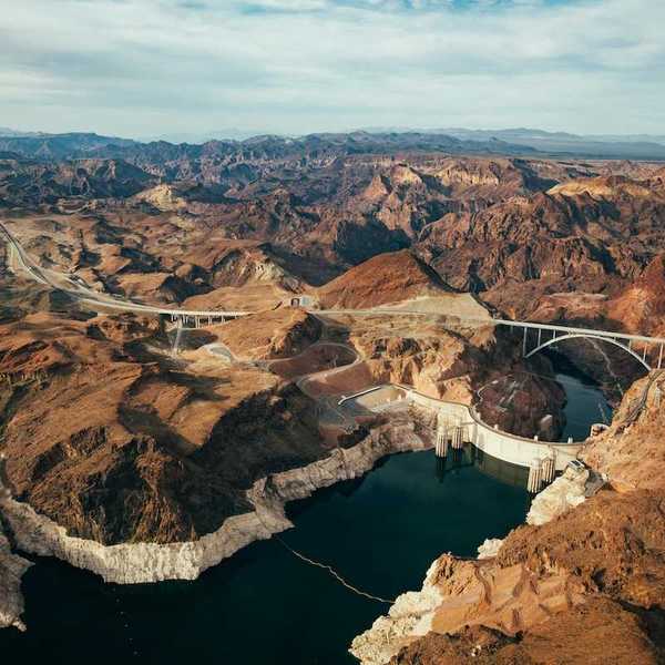 Aerial photo of Lake Mead and Hoover Dam showing low water level evidenced by a "bathtub ring."