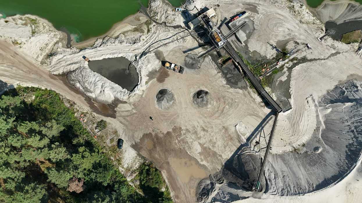 Aerial view of a sand and gravel quarry.