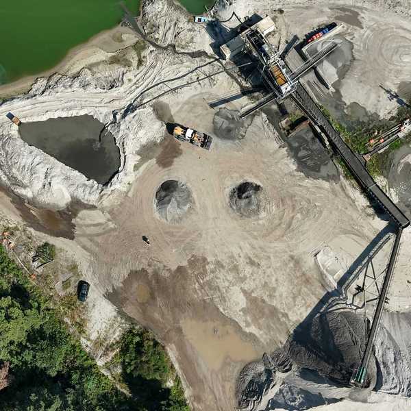 Aerial view of a sand and gravel quarry.