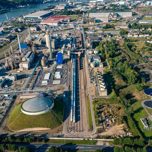 Aerial view of an industrial zone adjacent to housing