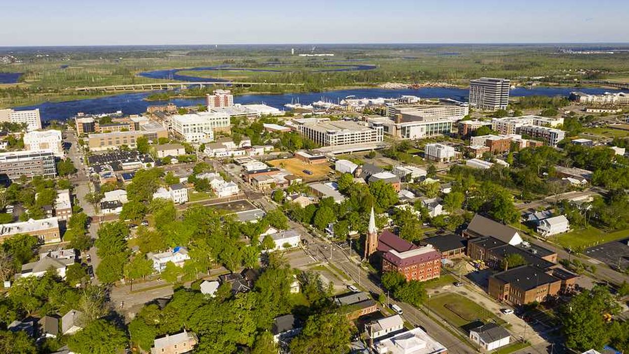 Aerial view of Wilmington NC building and river