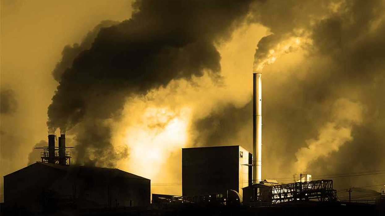 Air pollution coming from factory smoke stacks