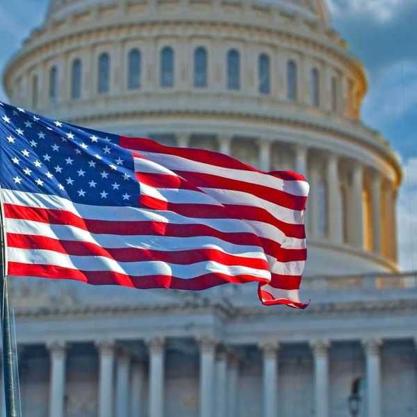 American flag superimposed against the U.S. capitol building.