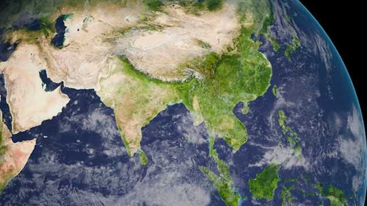 An aerial image of part of the earth with clouds visible