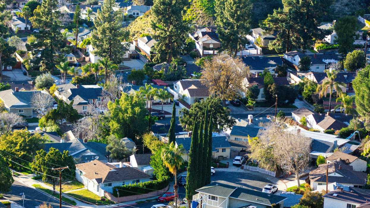 An aerial view of a city with lots of houses.