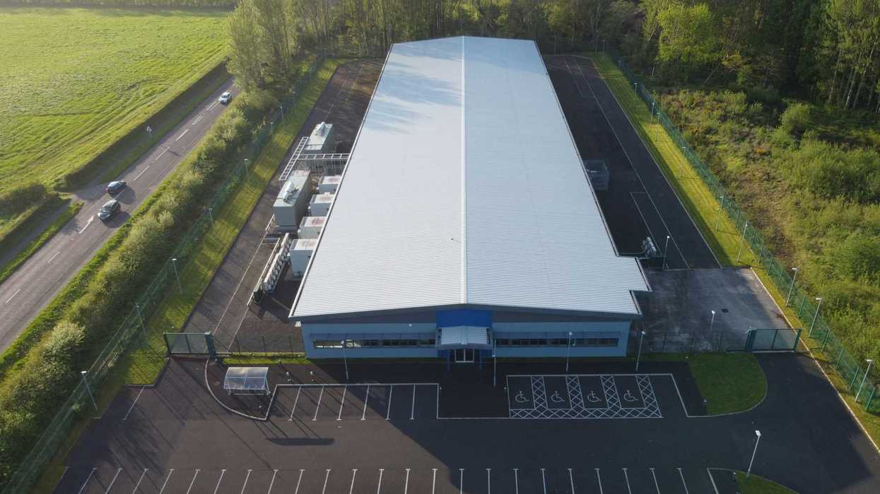 an aerial view of a large data center building.
