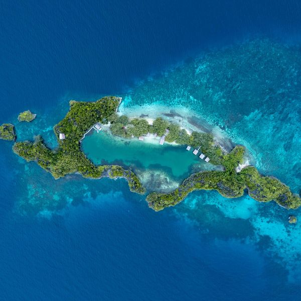 an aerial view of an island in the middle of the ocean