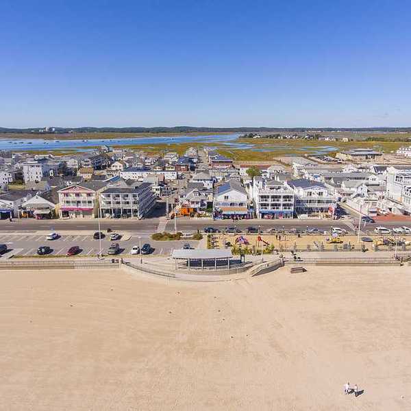An aerial view of historic waterfront buildings on Ocean Boulevard and Hampton Beach State Park, Town of Hampton, New Hampshire NH