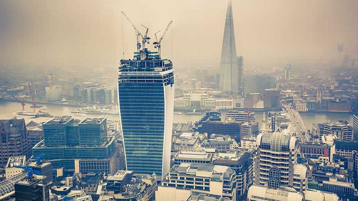 An aerial view of smoggy or foggy London buildings
