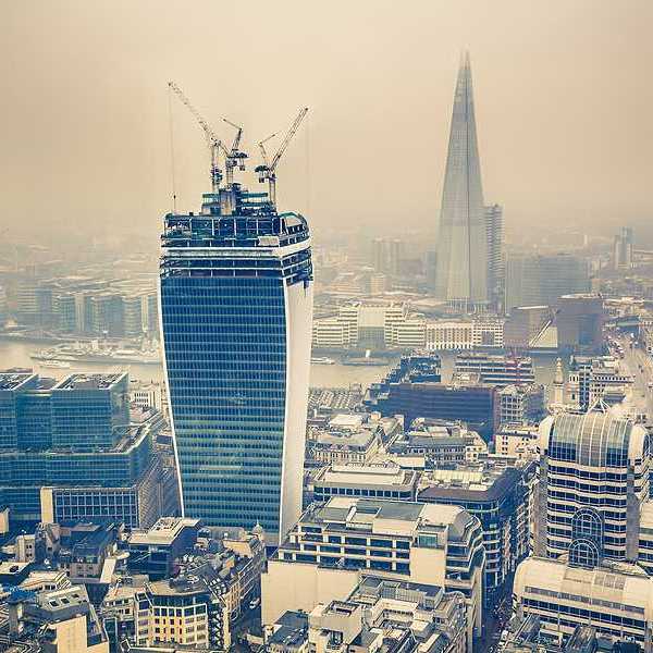 An aerial view of smoggy or foggy London buildings