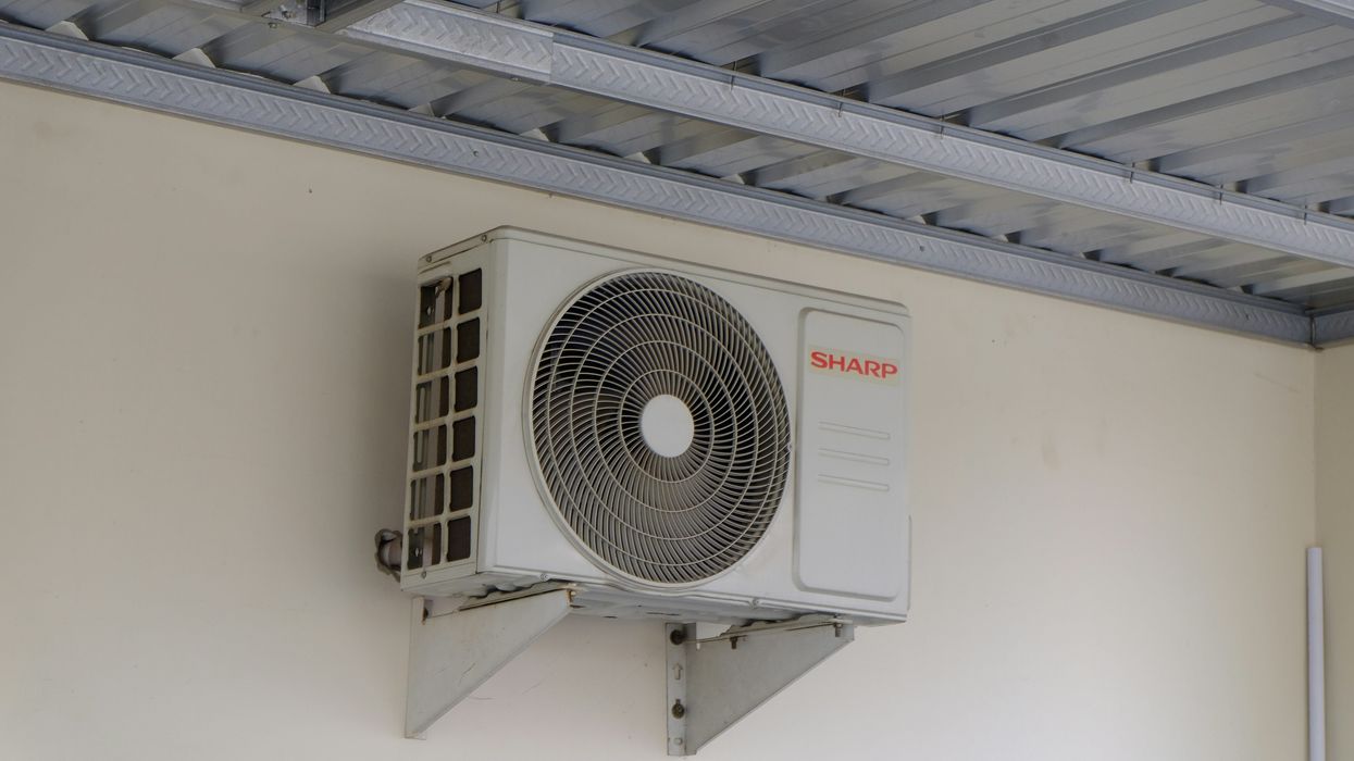 An air conditioning unit mounted on a wall.