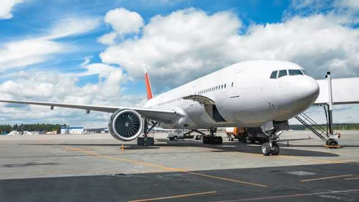 An airplane parked on the tarmac